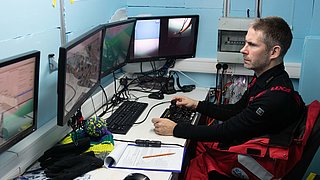 A researcher operating an ROV.